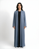 Front view of the Blue Mawjah Abaya with V-neck design in Dujalail fabric