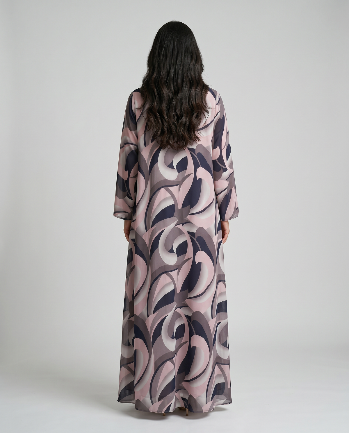 Back view of the Silken Flow Abaya in printed chiffon with matching Sheila