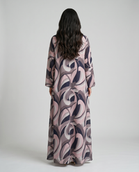 Back view of the Silken Flow Abaya in printed chiffon with matching Sheila